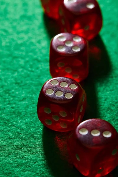 Close-up of live baccarat card deal with dealer hands visible